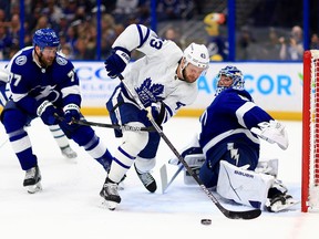 Andrei Vasilevskiy of the Tampa Bay Lightning stops a shot from Kyle Clifford of the Toronto Maple Leafs at Amalie Arena on April 21, 2022 in Tampa, Florida.
