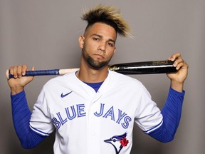 Lourdes Gurriel Jr. of the Toronto Blue Jays poses for a portrait during Photo Day at TD Ballpark on March 19, 2022 in Dunedin, Fla.