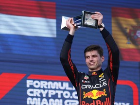 Race winner Max Verstappen of the Netherlands and Oracle Red Bull Racing celebrates on the podium during the F1 Grand Prix of Miami at the Miami International Autodrome on May 8, 2022 in Miami, Fla.