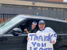 Dylan Atack, of Hamilton, was outside the Toronto Maple Leafs practice facility in Etobicoke on Tuesday, May 17, 2022, and was extremely grateful that Mitch Marner took time out to chat, sign an autograph and pose for a photo just one day after carjackers stole his Range Rover at gunpoint.