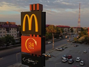 A McDonald's logo is on display outside the restaurant in Omsk, Russia, Thursday, May 18, 2022.
