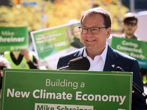 Ontario Green Party Leader Mike Schreiner smiles during a press conference at Bloor-Bedford Parkette in Toronto as part of his campaign tour, on Tuesday, May 17, 2022.