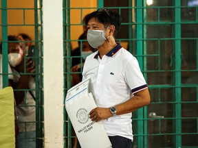 Marcos, son of strongman, poised for Philippines election triumph - Toronto Sun 3 Presidential aspirant Ferdinand Marcos Jr., the son and namesake of the late dictator, casts his vote in the 2022 national election at Mariano Marcos Memorial Elementary School in Batac, Ilocos Norte, Philippines, May 9, 2022.