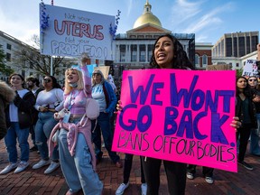 Pro-choice demonstrators rally outside the State House during a Pro-Choice Mother's Day Rally in Boston on May 8, 2022.