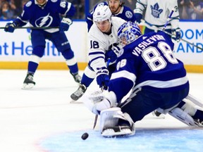 Tampa Bay’s  Andrei Vasilevskiy stops a shot from the Leafs’ Mitch Marner at Amalie Arena last night.  Getty Images