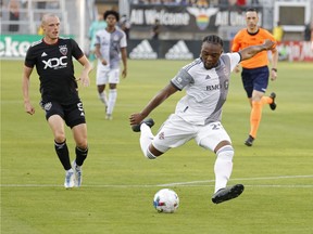 Toronto FC forward Ayo Akinola (20) scores a goal against D.C. United in the first half at Audi Field.