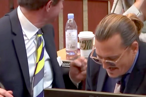 Benjamin Chew seen giving a celebratory gesture during Amber Heard’s testimony last week.