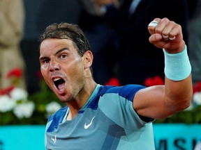 Spain's Rafael Nadal celebrates after winning his second round match against Serbia's Miomir Kecmanovic at the Madrid Open at Caja Magica, Madrid, Spain on May 4, 2022.