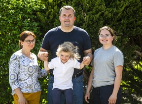 The Bolshov family fled the war in Kyiv, Ukraine, and have been in Canada for one week. Here, they pose for a photo in Toronto, Ont. on Friday, May 13, 2022. Olha and Serhii, with kids Stefa, 7, and Ivanna, 15.
