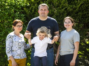 The Bolshov family fled the war in Kyiv, Ukraine, and have been in Canada for one week. Here, they pose for a photo in Toronto, Ont. on Friday, May 13, 2022. Olha and Serhii, with kids Stefa, 7, and Ivanna, 15.