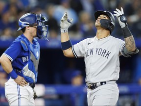 Gleyber Torres of the New York Yankees celebrates a two-run home run at the plate during the fourth inning of their MLB game against the Toronto Blue Jays at Rogers Centre on May 2, 2022 in Toronto.