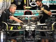 Mechanics work on Mercedes British driver Lewis Hamilton's car at the Circuit de Catalunya in Montmelo on the outskirts of Barcelona, on May 19, 2022 ahead of the Spanish Formula One Grand Prix.