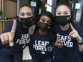 Staff at Real Sports cheer on the Toronto Maple Leafs on May 8, 2022.