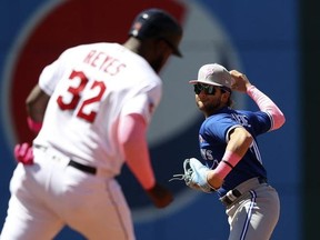 May 8, 2022; Cleveland, Ohio, USA;  Toronto Blue Jays Bo Bichette forces out Cleveland Guardians Franmil Reyes to start a double play during the third inning at Progressive Field.