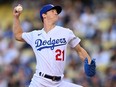 May 13, 2022; Los Angeles, California, USA;  Los Angeles Dodgers starting pitcher Walker Buehler (21) pitches in the second inning against the Philadelphia Phillies at Dodger Stadium.