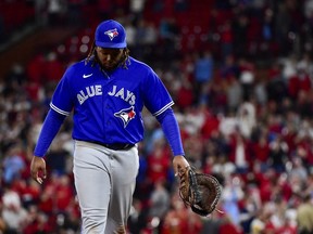 May 23, 2022; St. Louis, Missouri, USA;  Toronto Blue Jays first baseman Vladimir Guerrero Jr. (27) walks off the field after St. Louis Cardinals first baseman Paul Goldschmidt (not pictured) hit a walk-off grand slam during the tenth inning at Busch Stadium.