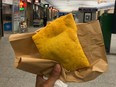 Closeup of beef patty from Fahmee Bakery at Warden subway station.