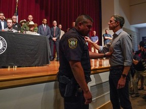 Texas Democratic gubernatorial candidate Beto O'Rourke disrupts a press conference held by Governor Greg Abbott the day after a gunman killed 19 children and two teachers at Robb Elementary School in Uvalde, Texas, May 25, 2022.