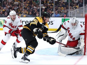 Pyotr Kochetkov of the Carolina Hurricanes saves a shot on goal during the third period of Game 3 of the First Round of the 2022 Stanley Cup Playoffs at TD Garden on May 6, 2022 in Boston.
