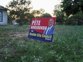 A political sign for Pete Arredondo, the Uvalde school district police chief, who is scheduled to be sworn in with the Uvalde City Council on May 29, 2022.