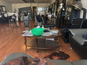 This photo shows the interior of Hair World Salon in Dallas on Thursday, May 12, 2022. Police searched Thursday for a man who opened fire inside a hair salon in Dallas' Koreatown area, wounding three people. Authorities do not yet know why the man shot the three female victims Wednesday afternoon at Hair World Salon, which is in a shopping center with many businesses owned by Korean Americans.
