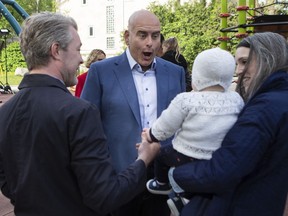 Ontario Liberal Leader Steven Del Duca speaks to families in a children's play area before making an announcement in Toronto, on Wednesday, May 18, 2022.