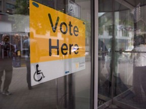 An Elections Ontario sign is seen at University - Rosedale voting location at the Toronto Reference Library on Thursday, June 7, 2018. Advance voting locations open today across Ontario as party leaders fan out across the province to pitch voters on their platforms.THE CANADIAN PRESS/Marta Iwanek