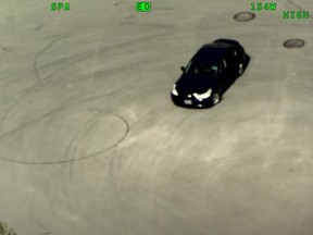 York police have released a video taken by Air2 of a sedan doing donuts, then driving 180 km/hr and passing other vehicles on the shoulder of a road and running a red light.