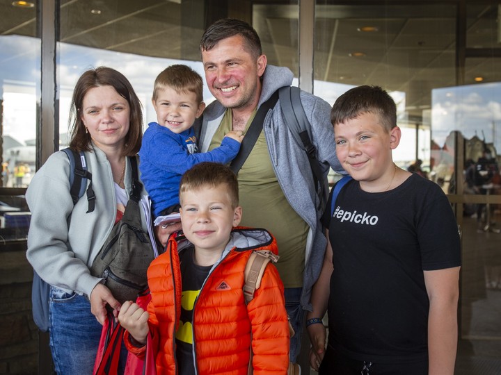  Roman and Olha Koval, and their three sons, Oleh, 11, Taras, 7, and Yurii, 3, are among a group of people fleeing the war from Ukraine, arriving at a terminal at Toronto Pearson International Airport on a plane from Poland, operated by Samaritan’s Purse Canada on Sunday, May 15, 2022. ERNEST DOROSZUK/TORONTO SUN