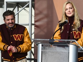 Washington Commanders co-CEOs and co-owners Dan and Tanya Snyder make remarks during the team name reveal event at FedEx Field in Landover, Md., on Feb. 2, 2022. MUST CREDIT: Washington Post photo by Jonathan Newton.