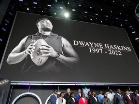A moment of silence is held for Dwayne Haskins before the first round of the 2022 NFL Draft at the NFL Draft Theater.