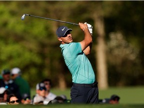 Brooks Koepka of the U.S. tees off on the 13th during the first round