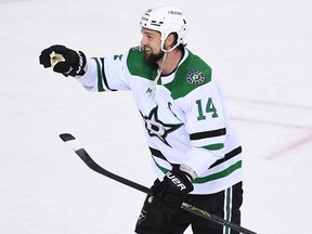Dallas Stars forward Jamie Benn gestures to the crowd after the win against the Calgary Flames in game two of the first round of the 2022 Stanley Cup Playoffs at Scotiabank Saddledome.