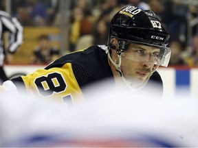 Pittsburgh Penguins center Sidney Crosby prepares to take a face-off against the New York Rangers during the second period in game four of the first round of the 2022 Stanley Cup Playoffs at PPG Paints Arena.