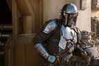 Pedro Pascal as the Mandalorian along with Grogu in a scene from Season 2 of the Star Wars spinoff.