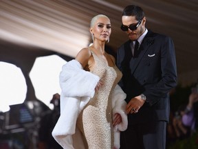 Kim Kardashian and comedian Pete Davidson arrive for the 2022 Met Gala at the Metropolitan Museum of Art on May 2, 2022, in New York.