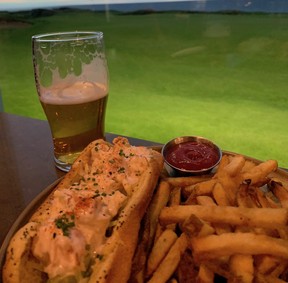 From the Cabot Bar, you can enjoy the sunset, golfers finishing up on the 18th hole, and a cold pint and excellent lobster roll (not necessarily in that order!). Rob Longley/Toronto Sun