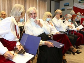 Life is getting back to normal at the long-term care facility,  Copernicus Lodge, on Roncevalles Ave. Anaela Lasek, 92, (pictured, second from left) was part of a ceremony to mark Polish Heritage month and the Second World War victory at Monte Cassino, on May 19, 2022.
