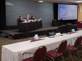 Commissioners Leanne Fitch, Michael MacDonald, chair, and Kim Stanton, left to right, attend the Mass Casualty Commission inquiry into the mass murders in rural Nova Scotia on April 18/19, 2020, in Truro, N.S. on Wednesday, May 25, 2022.