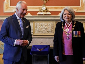 Prince Charles stands next to Governor General Mary Simon, while attending the Order of Military Merit Investiture Ceremony, on the second day of the Canadian 2022 Royal Tour, in Ottawa, May 18, 2022.