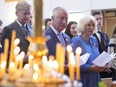 Prince Charles and Camilla, Duchess of Cornwall, take part in a traditional prayer service at a Ukrainian church in Ottawa on their Canadian Royal Tour, May 18, 2022.