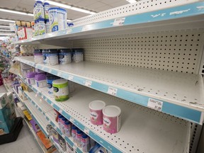 Shortages of many popular brands of baby formula are seen on a pharmacy shelf, Monday, May 16, 2022, in Montreal.