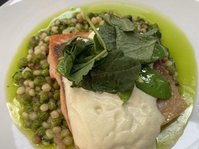 Trout with parsley and garlic sauce at Lena on Yonge is melt in your mouth.