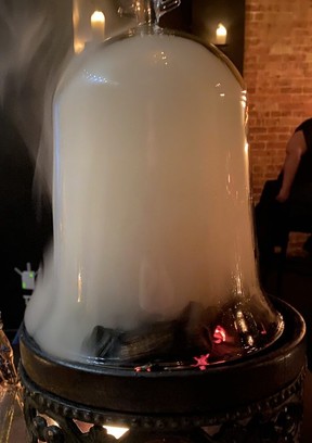 Like a campfire in a glass, BarChef’s famous Vanilla Hickory Smoked Manhattan.
