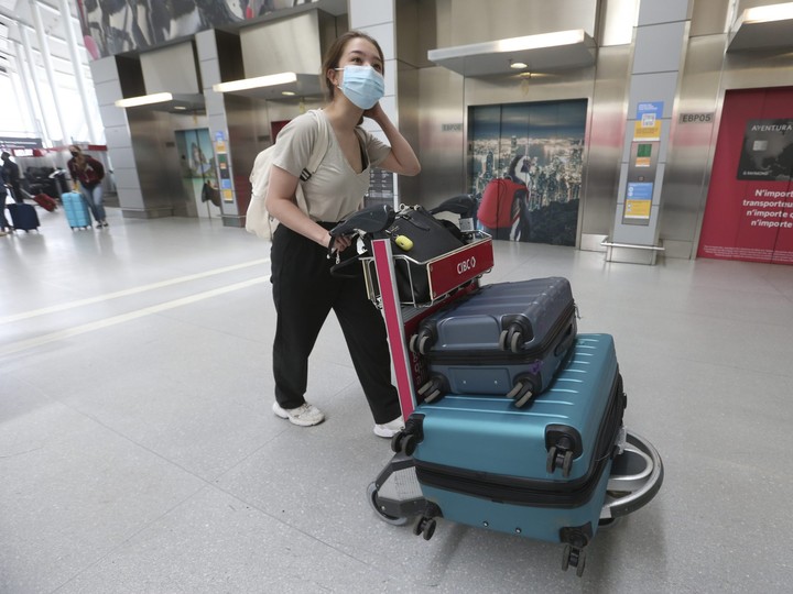  International student Alexandri Tsoy arrived to Pearson airport more than four hours early for her flight to Kazakhstan. JACK BOLAND/TORONTO SUN