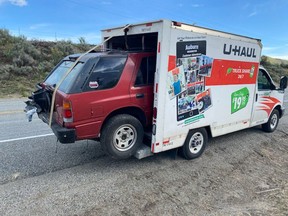A Washington driver has been fined $139 after being caught driving a rented U-Haul truck with an unsecured car hanging out of the back.