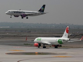 A Volaris airplane lands in Zumpango, Mexico April 23, 2022.