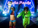 WWE superstars Sasha Banks and Naomi at a WWE U.K. event in April.