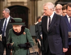 Queen Elizabeth and son Prince Andrew, Duke of York arrive to attend a Service of Thanksgiving for Prince Philip, Duke of Edinburgh, at Westminster Abbey in London on March 29, 2022.