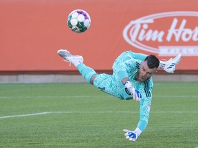 Toronto FC goalkeeper Quentin Westberg makes a save against Forge FC.